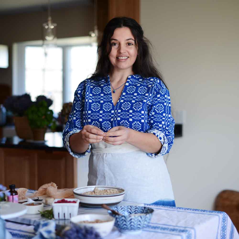 Kaity Farrell baking at her kitchen table