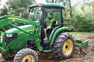 Katie Stagliano on a tractor